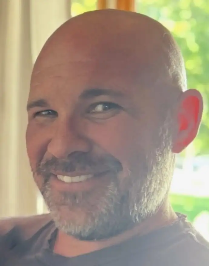 John A. DeMarco III, smiling