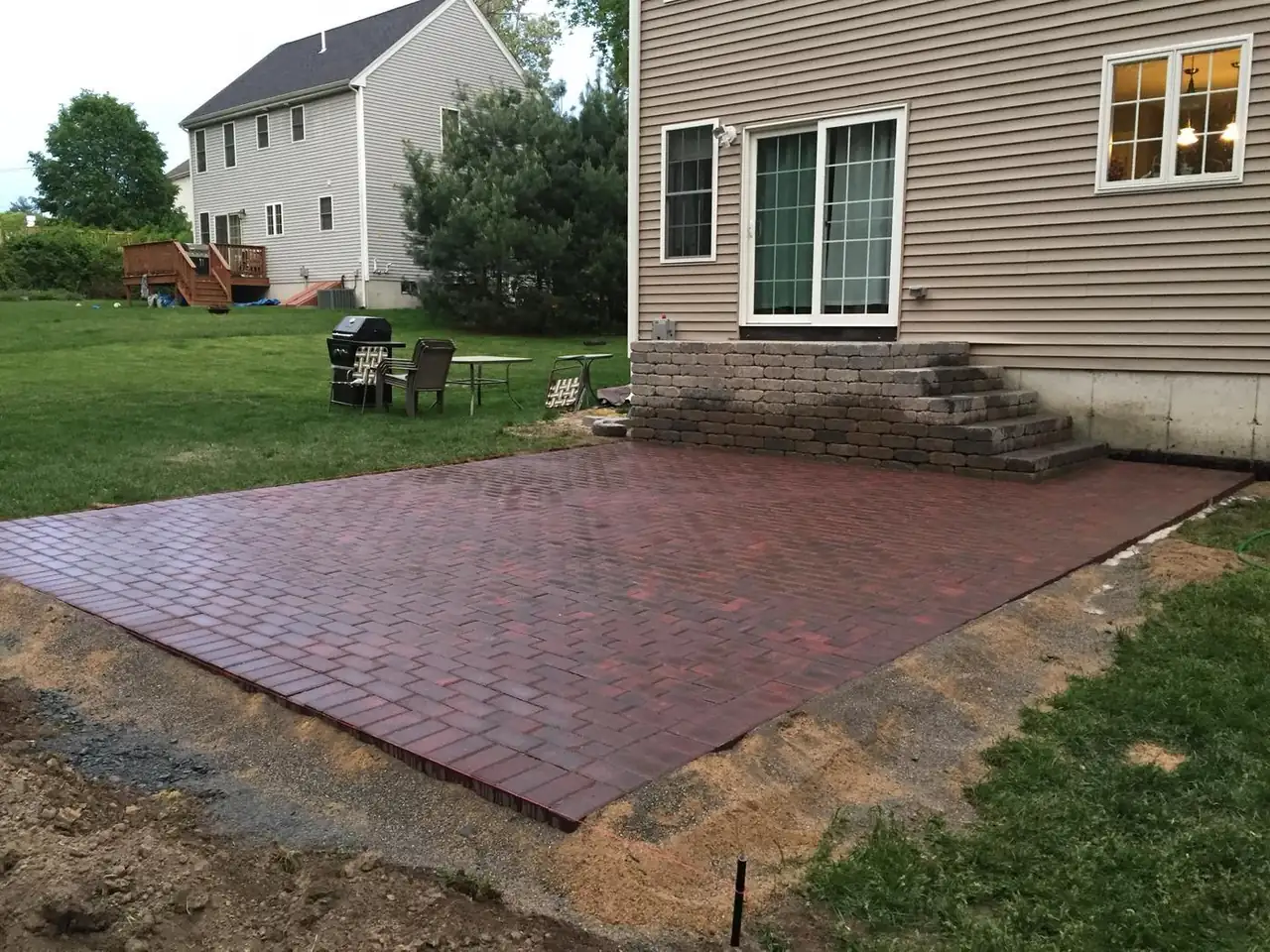 Brick paver patio with block steps